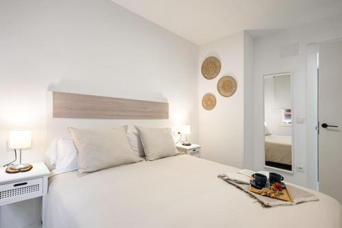 Postel nebo postele na pokoji v ubytování Apartamento Frida centro Gijón