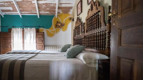 Postel nebo postele na pokoji v ubytování Casa Rural Andrea