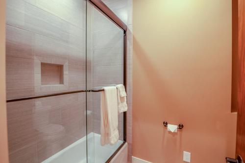 a shower stall with a glass door in a bathroom at Robins Crest in Boone