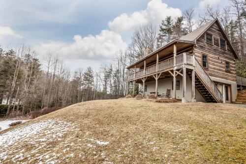 a large house on top of a hill at Trailhead Cabin in Boone