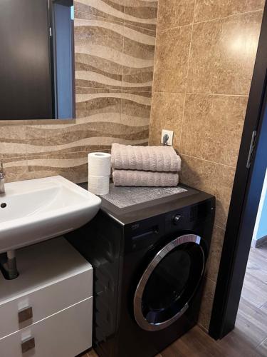 Ένα μπάνιο στο Apartament Studio Jadis 1
