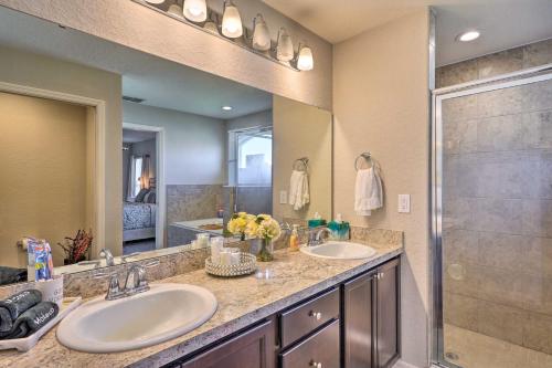 a bathroom with two sinks and a shower at Eagle Lake Home Less Than 7 Mi to Legoland! in Eagle Lake
