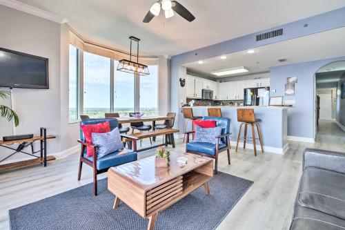 a living room with a couch and a table at Family Resort Condo with 2 Pools 1 Mi to Disney! in Orlando