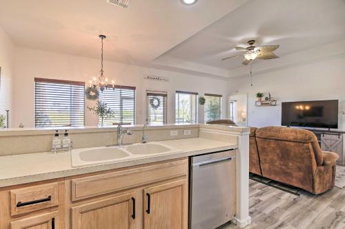 a kitchen with a sink and a living room at Vacation Home Rental Near South Padre Island in Laguna Vista