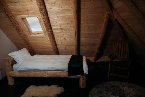 Postel nebo postele na pokoji v ubytování Huta Village