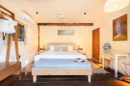Katil atau katil-katil dalam bilik di Casa Ganesh Tulum-Beachfront hotel by Ahau Collection