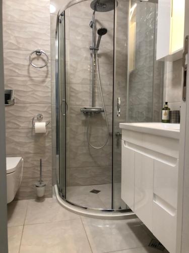 Et badeværelse på Purple Rose Apartment Valencia Gardens