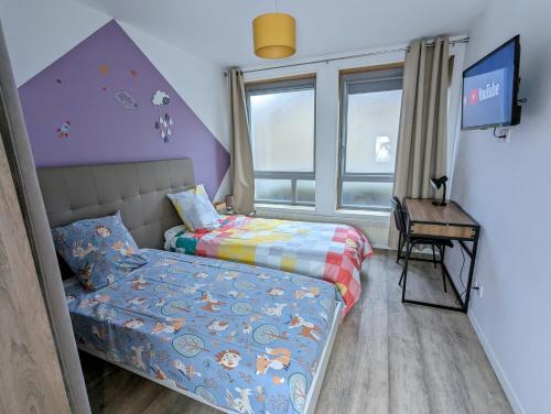 Postel nebo postele na pokoji v ubytování Beau-Jean, Un Cocon Sympa 5 min à Pied du Centre-Ville, Parking Privé, à 10 min du CHU