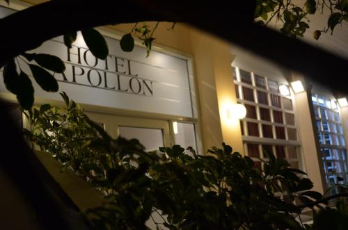 a building with a sign that reads hotel pollylon at Apollon Hotel in Ancient Epidavros