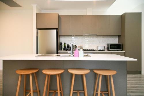 Η κουζίνα ή μικρή κουζίνα στο Hilton Executive Apartments