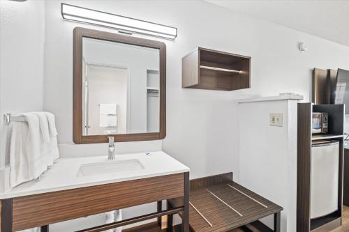 a bathroom with a sink and a mirror at Motel 6-Bend, OR in Bend