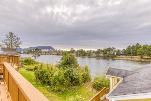 a view of a river from a house at Riveredge Retreat in Seaside