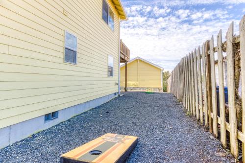 a building with a ramp next to a fence at Riveredge Retreat in Seaside