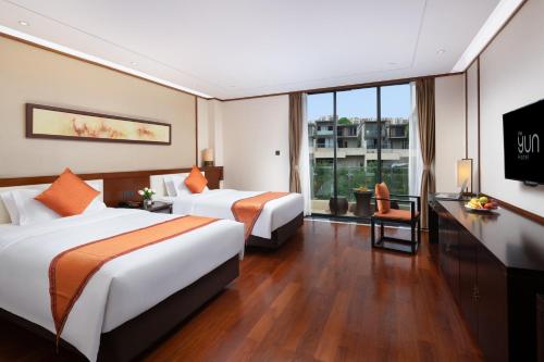 Una cama o camas en una habitación de The Yun Resort QingYuan