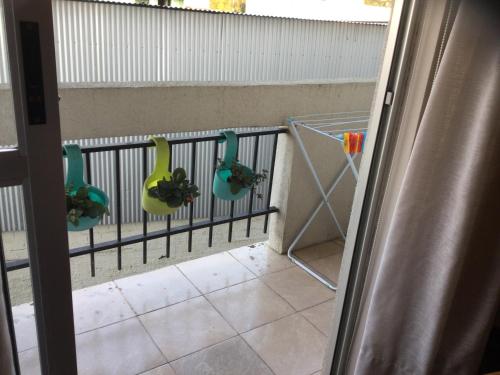 Balkoni atau teres di Conforto e simplicidade no centro da cidade