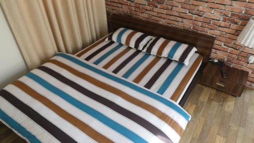 Postel nebo postele na pokoji v ubytování NhuChhe Apartments