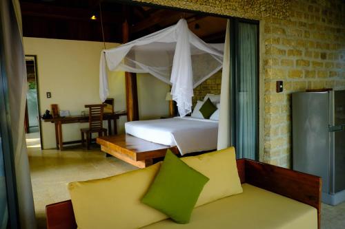 Ένα ή περισσότερα κρεβάτια σε δωμάτιο στο The Trang Villas