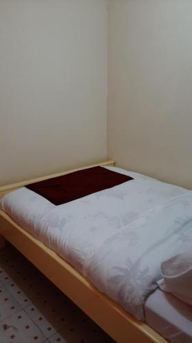 Tempat tidur dalam kamar di Cascade Homes Nakuru Section 58