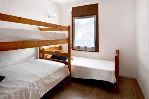 A bed or beds in a room at Flor casa con piscina privada