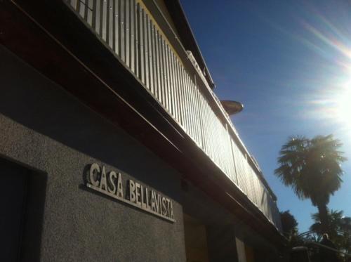 a building with a sign that reads casa bibliography at Casa Bellavista in Pugerna