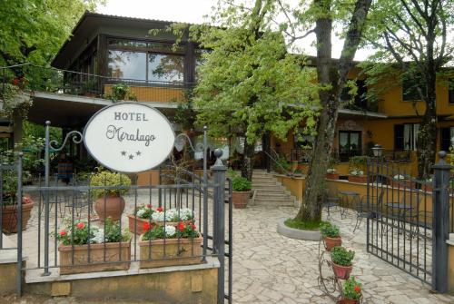 a hotel awakening sign in front of a building at Miralago in Albano Laziale