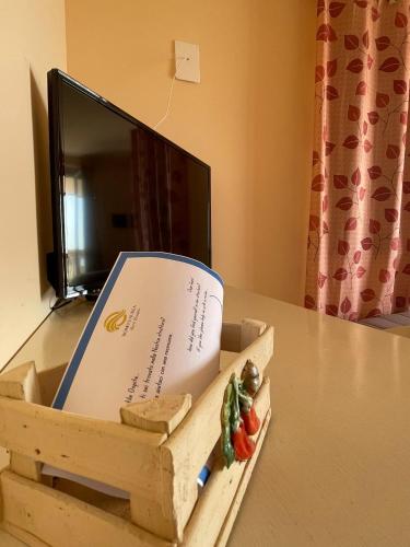 Μια τηλεόραση ή/και κέντρο ψυχαγωγίας στο Residenza Domus Aurea Tropea- Vista Mare