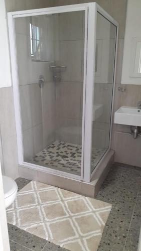 Ένα μπάνιο στο The Wishing Well Guest House Self-Catering