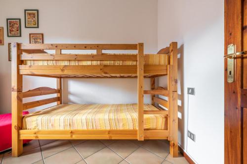 a couple of bunk beds in a room at Maya in Villasimius