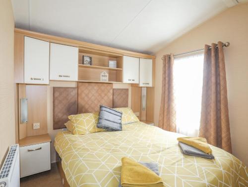 Un pat sau paturi într-o cameră la Mountain View Lodge