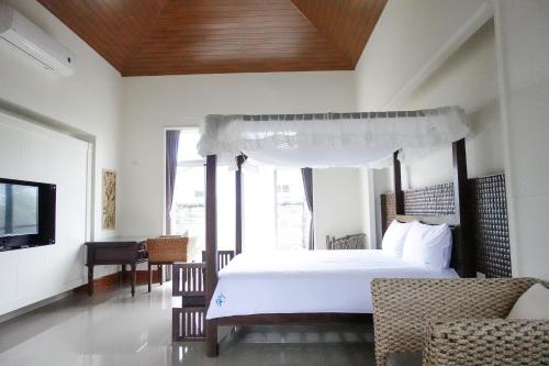 Cama ou camas em um quarto em 艸祭莊園Tsai Villa