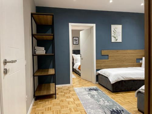 Postel nebo postele na pokoji v ubytování Premium Apartments