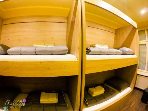 two empty bunk beds in a room at BeFree Hostel - Self-Service in Vienna
