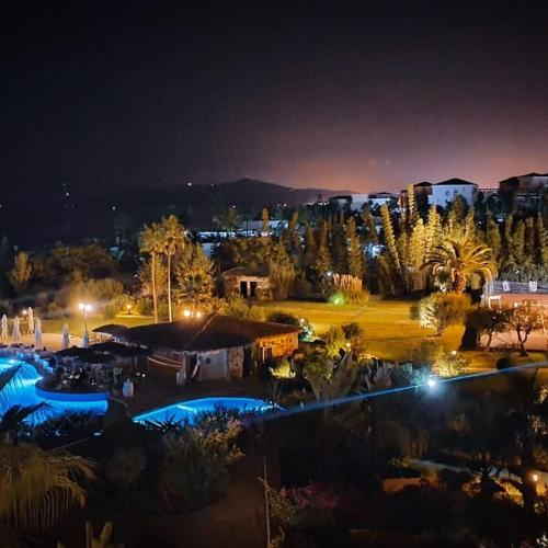 a view of a resort at night with lights at Marina Smir Hotel & Spa in M'diq