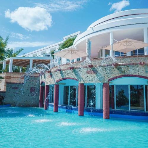 a resort with a swimming pool in the water at Marina Smir Hotel & Spa in M'diq