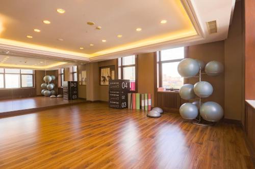 a large room with a dance floor with balloons at Changzhou Yuanzhou Hotel in Changzhou