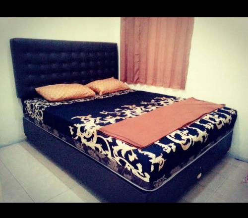 Säng eller sängar i ett rum på Homestay Bukit Dagi Borobudur