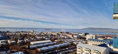 an aerial view of a city with buildings and the water at Panoramic Studio Apartment with stunning view - Free Parking in Reykjavík