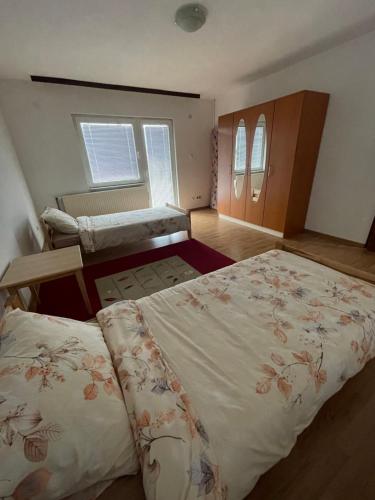 Ένα ή περισσότερα κρεβάτια σε δωμάτιο στο Apartment Rea Ilidža