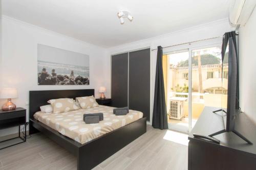 Posteľ alebo postele v izbe v ubytovaní Apartamento con vistas al mar y al lado de todo