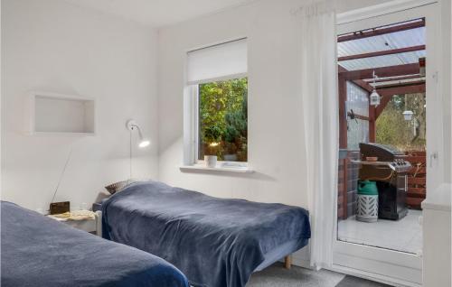 Voodi või voodid majutusasutuse 3 Bedroom Stunning Home In Vesterborg toas