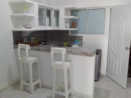 Kuchyň nebo kuchyňský kout v ubytování Appart-hotel Veras Samana No 9
