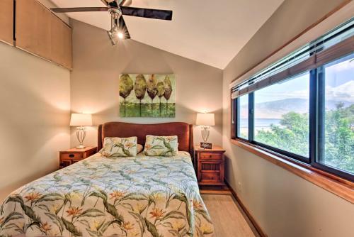 a bedroom with a bed and a large window at Stunning South Maui Condo with Lanai by Beach! in Kihei