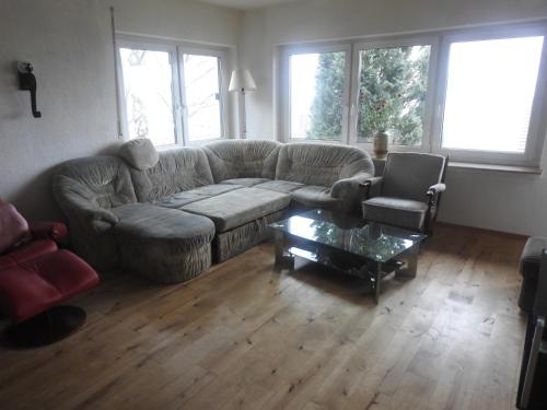 a living room with a couch and a coffee table at Bergblick in Medebach