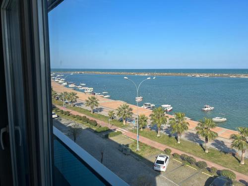 a view of the ocean from a hotel window at Çepni's HOTEL in Samsun
