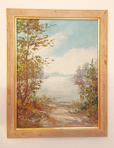 a painting of a view of a lake at Villa Hoffnung in Bad Elster