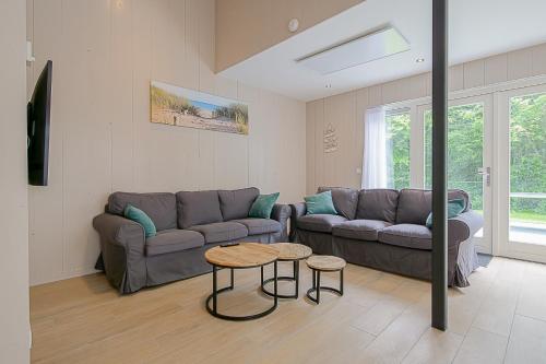 Χώρος καθιστικού στο Vakantiehuis Vicky - Julianadorp aan Zee