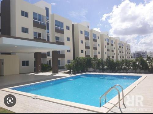 Bazén v ubytování Hermoso residencial con piscina,seguridad 24 horas nebo v jeho okolí