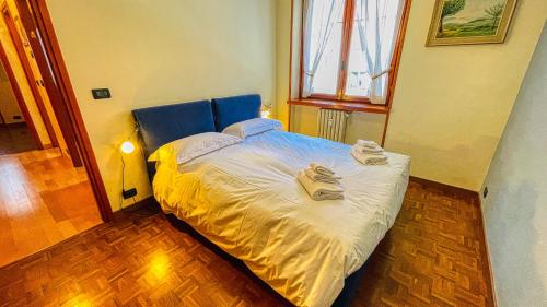 A bed or beds in a room at Appartamento Des Amis - Affitti Brevi Italia