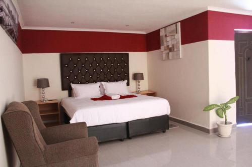 Postel nebo postele na pokoji v ubytování Apple Guesthouse