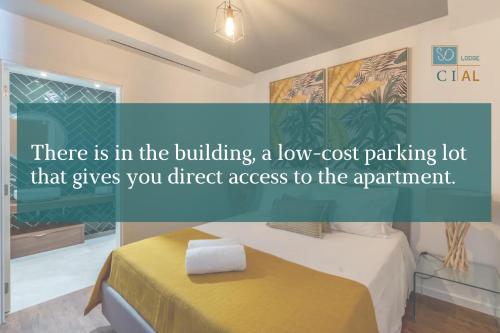 a hotel room with a bed and a sign that says there is in the building at SOCIAL LODGE - Centro do Funchal in Funchal